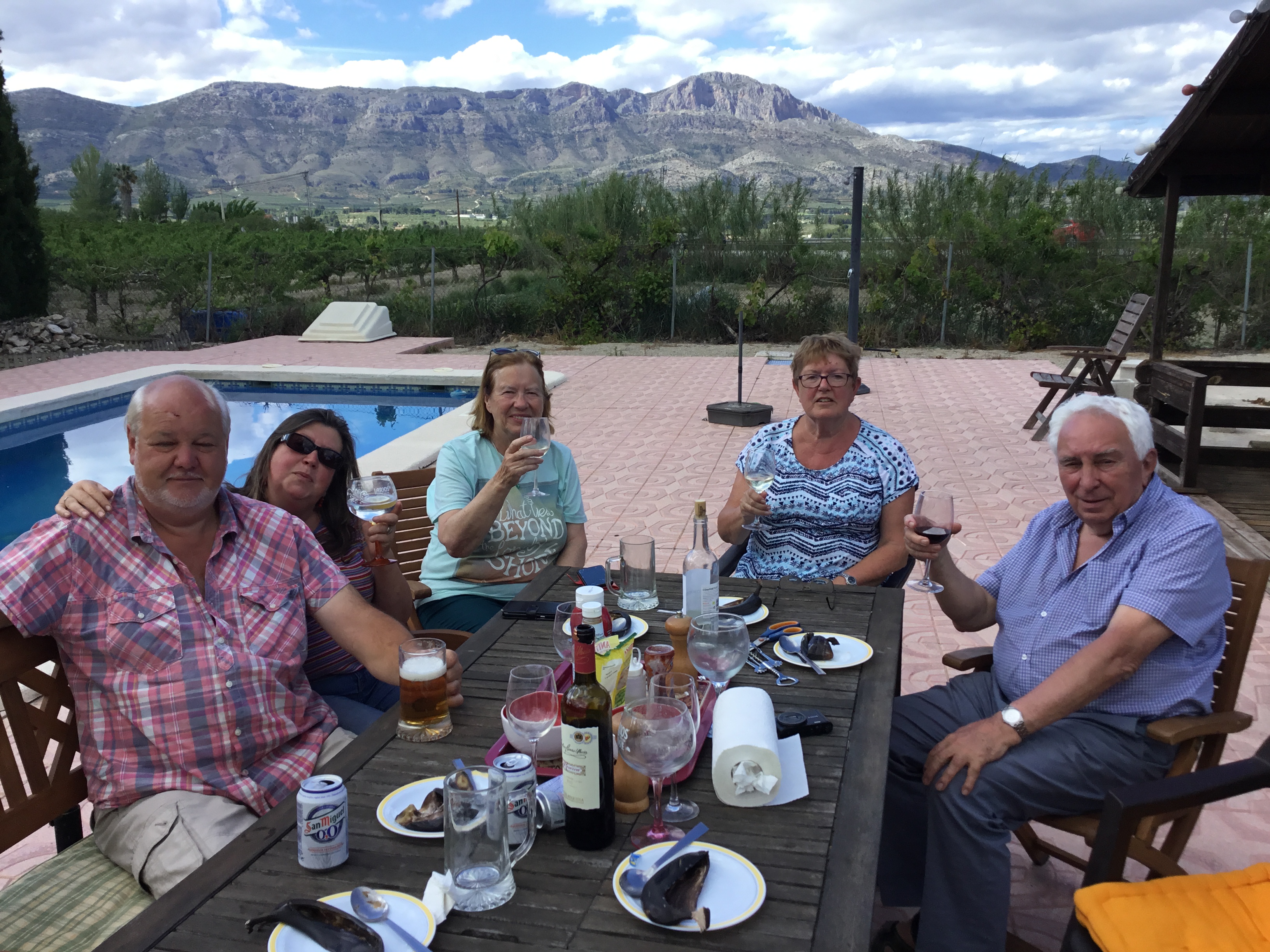 people round table with drinks
